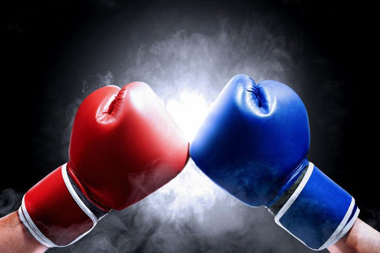 Red and Blue Boxing Gloves at Start of a Match