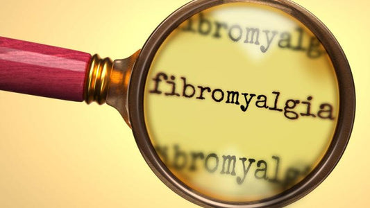 Magnifying Glass Hovering Over the word Fibromyalgia
